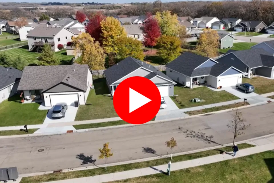 Homes on Red Hawk Drive with play button