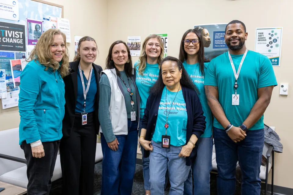 D&O Victim Services staff wearing teal 