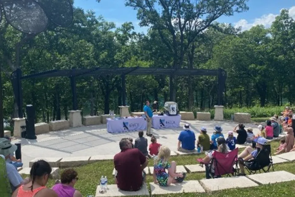 Amphitheater with people sitting around