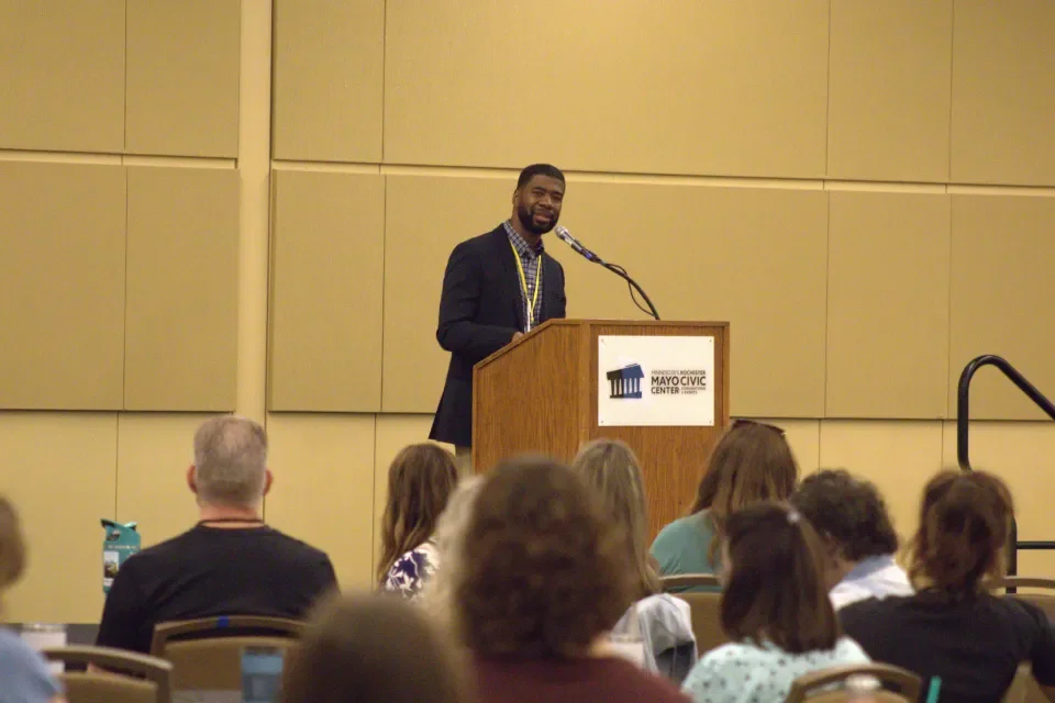 Gil Domally speaking at Conference 