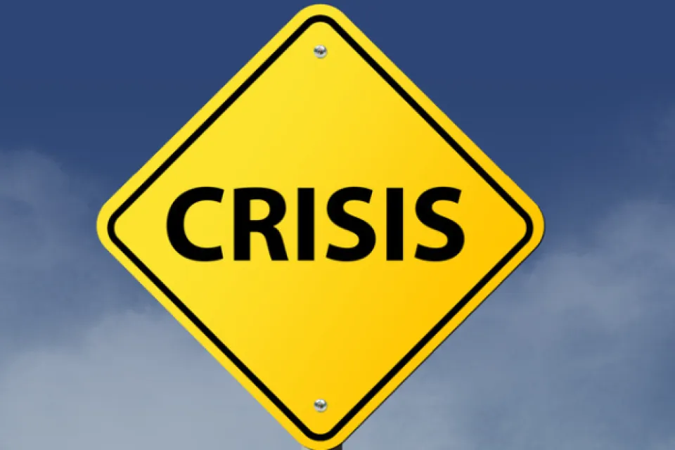 Sign that says crisis