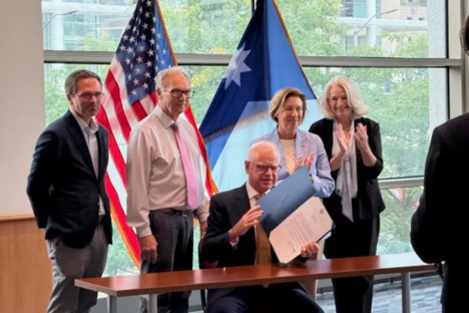 Governor Walz and others at ceremonial bill signing of IT Modernization bill