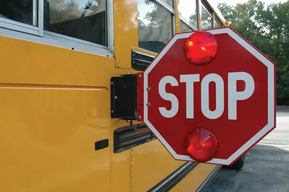 School Bus with stop arm extended.